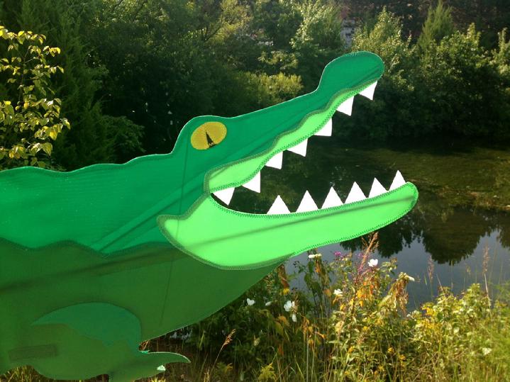 presenting allie the alligator spinner from bald eagle flag store fredericksburg va, alligator spinner whirligig rotates and spins in the wind,  call or visit bald eagle flag store when you are in fredericksburg va