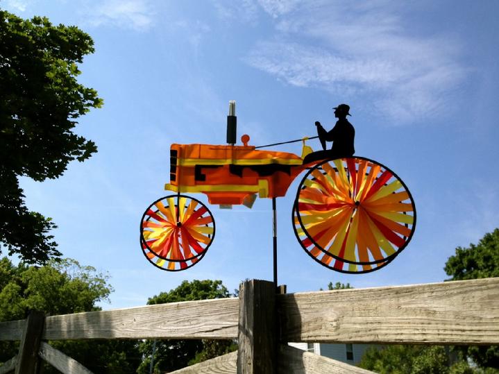 ORANGE TRACTOR GARDEN SPINNER BY BALD EAGLE FLAG STORE DIVISION OF BALD EAGLE INDUSTRIES SERVING FREDERICKSBURG, RICHMOND, HAMPTON, NEWPORT NEWS, NORFOLK, VA BEACH, ARLINGTON, ALEXANDRIA, FAIRFAX, STAFFORD, ASHLAND, MIDLOTHIAN, PETERSBURG, CHARLOTTESVILLE, CULPEPER, WARRENTON, MANASSAS, HAYMARKET, FRONT ROYAL, STRAUSBURG VA