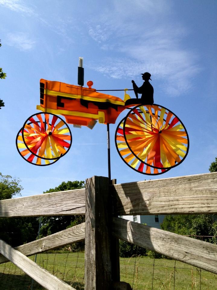 ORANGE TRACTOR GARDEN SPINNER BY BALD EAGLE FLAG STORE DIVISION OF BALD EAGLE INDUSTRIES SERVING FREDERICKSBURG, RICHMOND, HAMPTON, NEWPORT NEWS, NORFOLK, VA BEACH, ARLINGTON, ALEXANDRIA, FAIRFAX, STAFFORD, ASHLAND, MIDLOTHIAN, PETERSBURG, CHARLOTTESVILLE, CULPEPER, WARRENTON, MANASSAS, HAYMARKET, FRONT ROYAL, STRAUSBURG VA