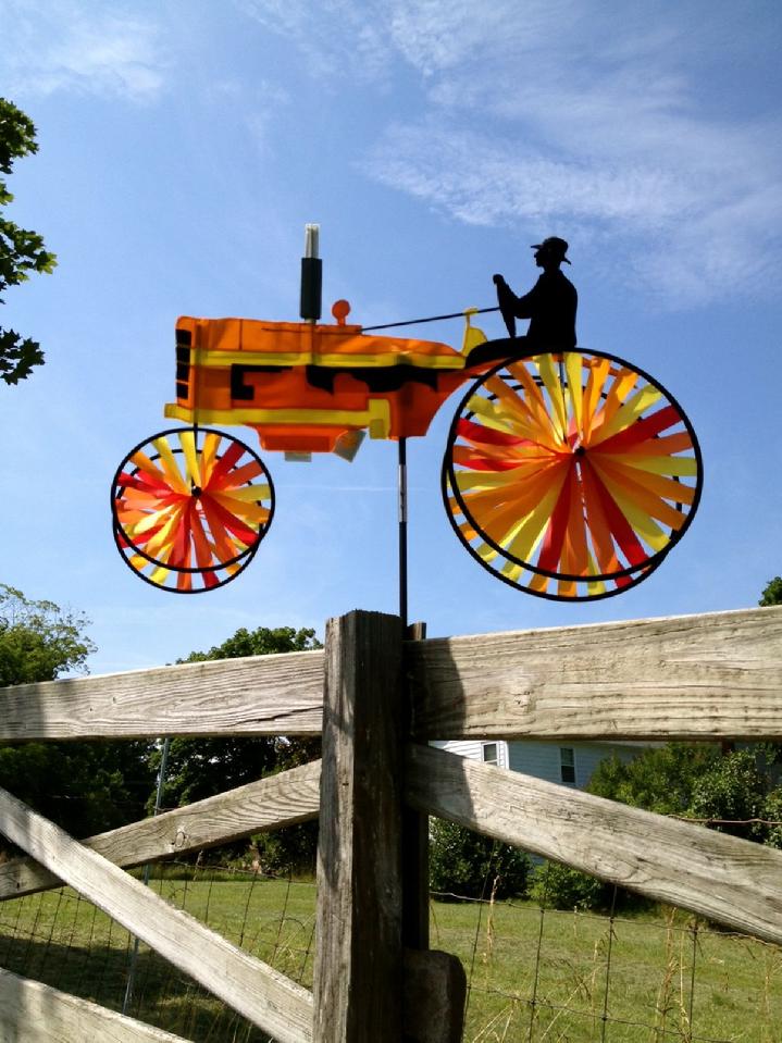 ORANGE TRACTOR GARDEN SPINNER BY BALD EAGLE FLAG STORE DIVISION OF BALD EAGLE INDUSTRIES SERVING FREDERICKSBURG, RICHMOND, HAMPTON, NEWPORT NEWS, NORFOLK, VA BEACH, ARLINGTON, ALEXANDRIA, FAIRFAX, STAFFORD, ASHLAND, MIDLOTHIAN, PETERSBURG, CHARLOTTESVILLE, CULPEPER, WARRENTON, MANASSAS, HAYMARKET, FRONT ROYAL, STRAUSBURG VA