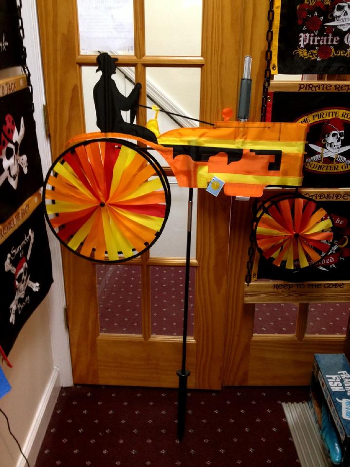 orange tractor lawn spinner from bald eagle flag store