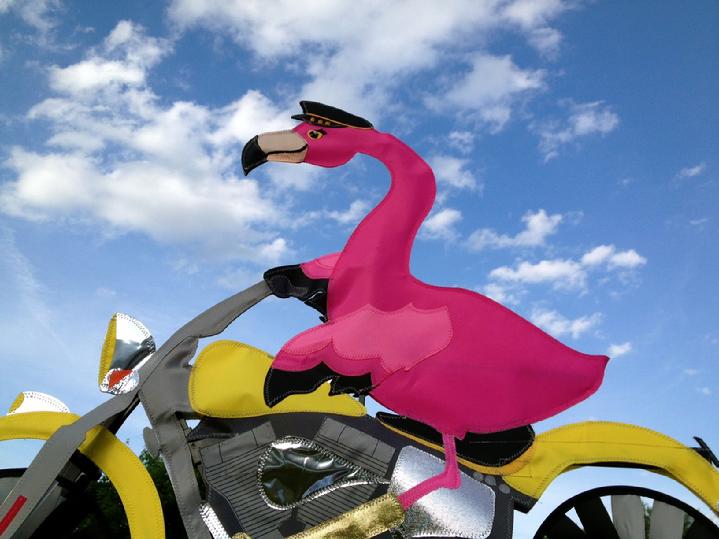 flamingo biker spinner at bald eagle flag store fredericksburg va, flamingo riding a motorcycle on route 3 at bald eagle flag store