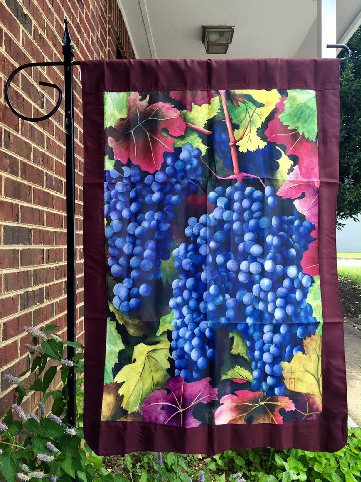 GRAPES FLAG FOR A VINEYARD BY BALD EAGLE FLAG STORE IN FREDERICKSBURG VIRGINIA 540-374-3480 PHOTOGRAPH BY BALDEAGLEINDUSTRIES.COM