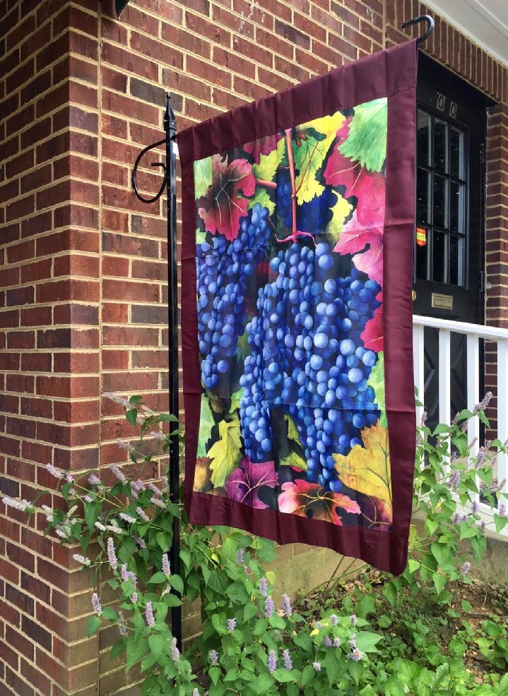 GRAPES FLAG FOR A VINEYARD BY BALD EAGLE FLAG STORE IN FREDERICKSBURG VIRGINIA 540-374-3480 PHOTOGRAPH BY BALDEAGLEINDUSTRIES.COM
