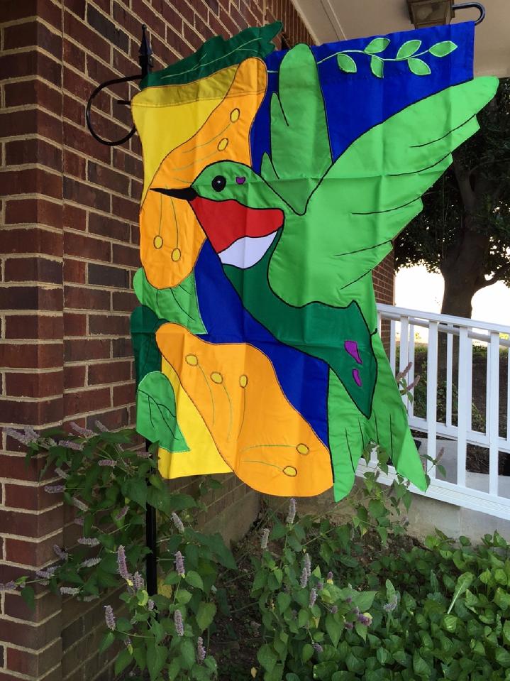 HUMMINGBIRD FLAG AT BALD EAGLE FLAG STORE FREDERICKSBURG VIRGINIA 540-374-3480 BEAUTIFUL RED THROAT HUMMINGBIRD FLAG FROM OUR PRIVATE COLLECTION OF VINTAGE FLAGS 540-374-3480 PHOTOGRAPH BY BALDEAGLEINDUSTRIES.COM