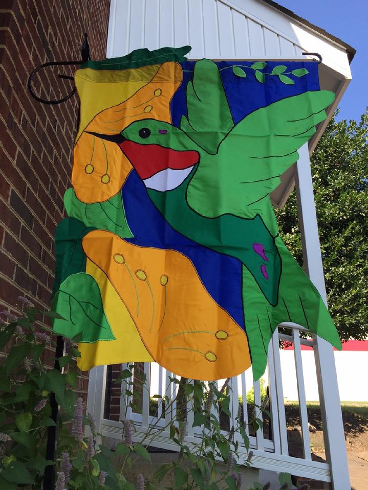 HUMMINGBIRD FLAG AT BALD EAGLE FLAG STORE FREDERICKSBURG VIRGINIA 540-374-3480 BEAUTIFUL RED THROAT HUMMINGBIRD FLAG FROM OUR PRIVATE COLLECTION OF VINTAGE FLAGS 540-374-3480 PHOTOGRAPH BY BALDEAGLEINDUSTRIES.COM