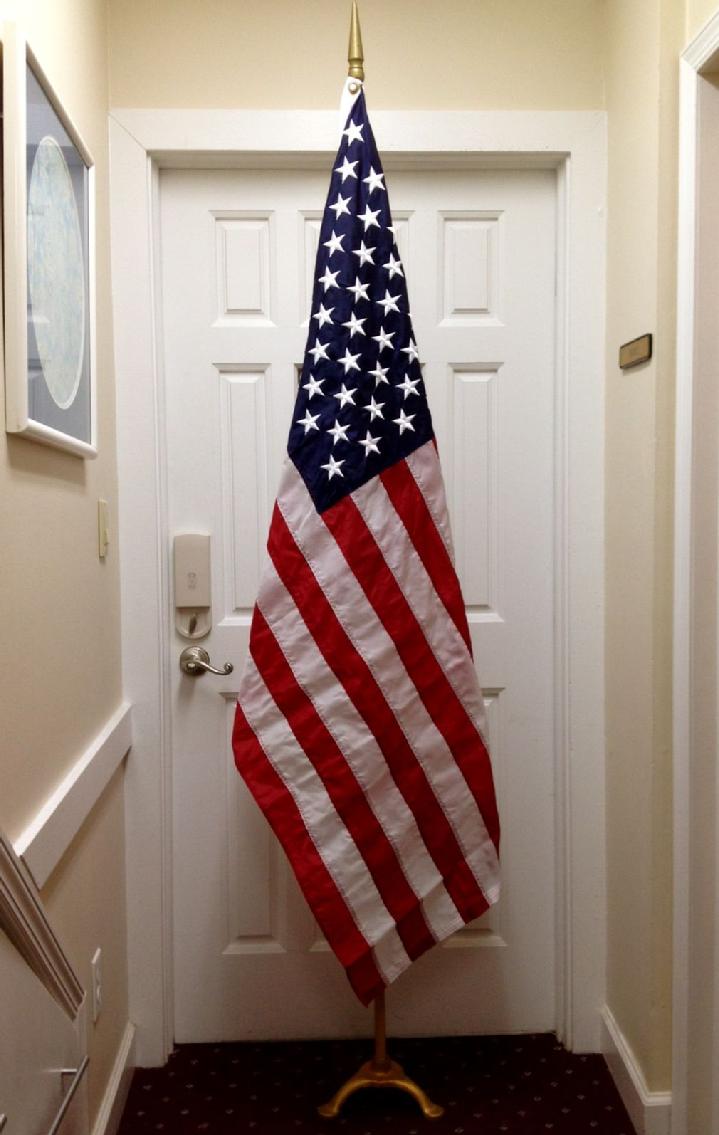 indoor spear top flagpole and flag stand displayed with american flag from bald eagle industries and bald eagle flag store fredericksburg va