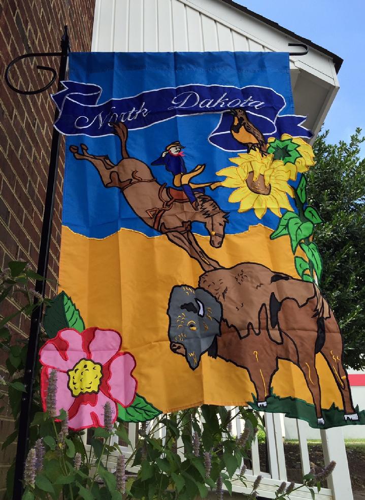 NORTH DAKOTA FLAG AT BALD EAGLE FLAG STORE FREDERICKSBURG VIRGINIA USA 540-374-3480 PHOTOGRAPH BY BALDEAGLEINDUSTRIES.COM