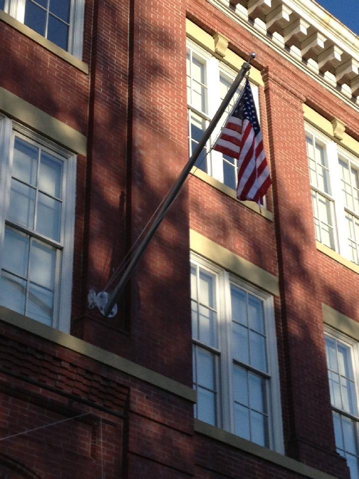 OUTRIGGER WALL MOUNT FLAGPOLE ALUMINUM FLAGPOLE BY BALD EAGLE FLAG STORE 540-374-3480 BALDEAGLEINDUSTRIES.COM  oldest commercial flagpole and flag store in Fredericksburg serving Richmond, Petersburg, Hampton, Newport News, Norfolk, Va Beach, Arlington, Alexandria, Fairfax, Springfield, Woodbridge, Quantico Mrine Corps Base, Stafford