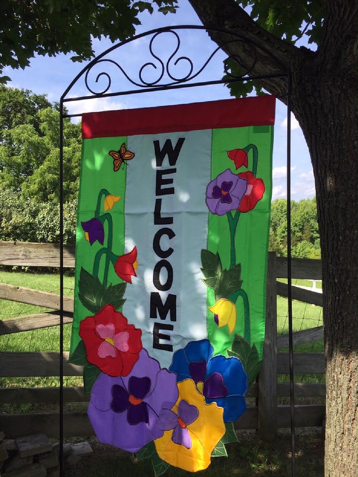 PANSIES FLAG WELCOME FLAG SALES BY BALD EAGLE FLAG STORE FREDERICKSBURG VA USA 540-374-3480 PHOTOGRAPH BY BALDEAGLEINDUSTRIES.COM