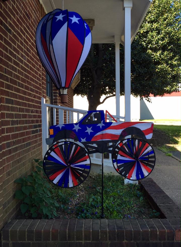 PATRIOTIC DECORATION AMERICAN FLAG PICKUP TRUCK AND HOT AIR BALLOON SPINNER BY BALD EAGLE FLAG STORE SERVING FREDERICKSBURG, RICHMOND, HAMPTON, NEWPORT NEWS, NORFOLK, VA BEACH, ARLINGTON, ALEXANDRIA, FAIRFAX, WINCHESTER, HARRISONBURG, ROANOKE, CHARLOTTESVILLE, WARRANTOR, STAFFORD (540) 374-3480 PHOTOGRAPH BY BALDEAGLEINDUSTRIES.COM