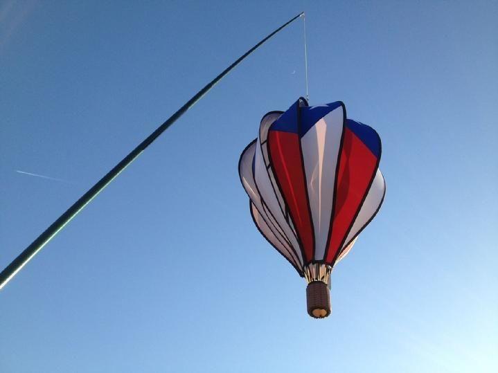 HOT AIR BALLOON SALES BY BALD EAGLE FLAG STORE FREDERICKSBURG VA USA, 540-374-3480 HOT AIR BALLOON SPINS IN THE WIND, PHOTOGRAPH BY BALDEAGLEINDUSTRIES.COM