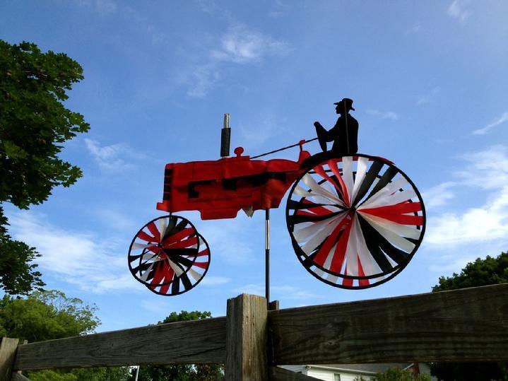 RED TRACTOR GARDEN SPINNER BY BALD EAGLE FLAG STORE DIVISION OF BALD EAGLE INDUSTRIES SERVING FREDERICKSBURG, RICHMOND, HAMPTON, NEWPORT NEWS, NORFOLK, VA BEACH, ARLINGTON, ALEXANDRIA, FAIRFAX, STAFFORD, ASHLAND, MIDLOTHIAN, PETERSBURG, CHARLOTTESVILLE, CULPEPER, WARRENTON, MANASSAS, HAYMARKET, FRONT ROYAL, STRAUSBURG VA