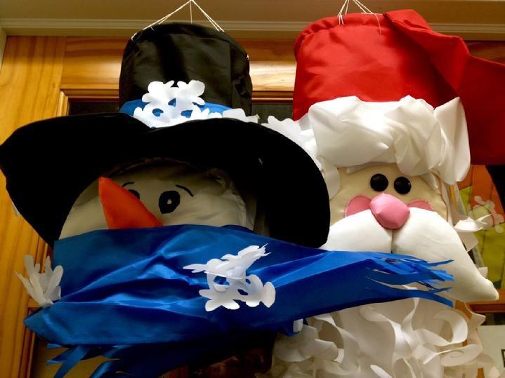 SANTA WINDSOCK AND FROSTY WINDSOCK BY BALD EAGLE FLAG STORE FREDERICKSBURG VA USA 540-374-3480 PHOTOGRAPH BY BALDEAGLEINDUSTRIES.COM