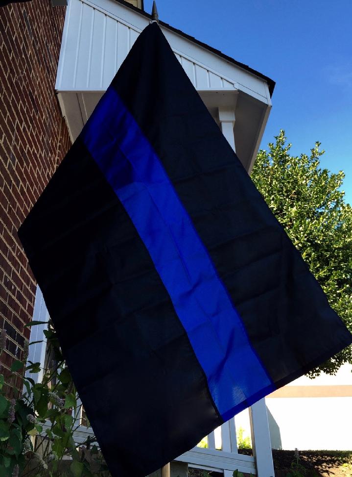 THIN BLUE LINE FLAG BY BALD EAGLE FLAG STORE DIVISION OF BALD EAGLE INDUSTRIES 540-374-3480 PHOTOGRAPH BY BALDEAGLEINDUSTRIES.COM