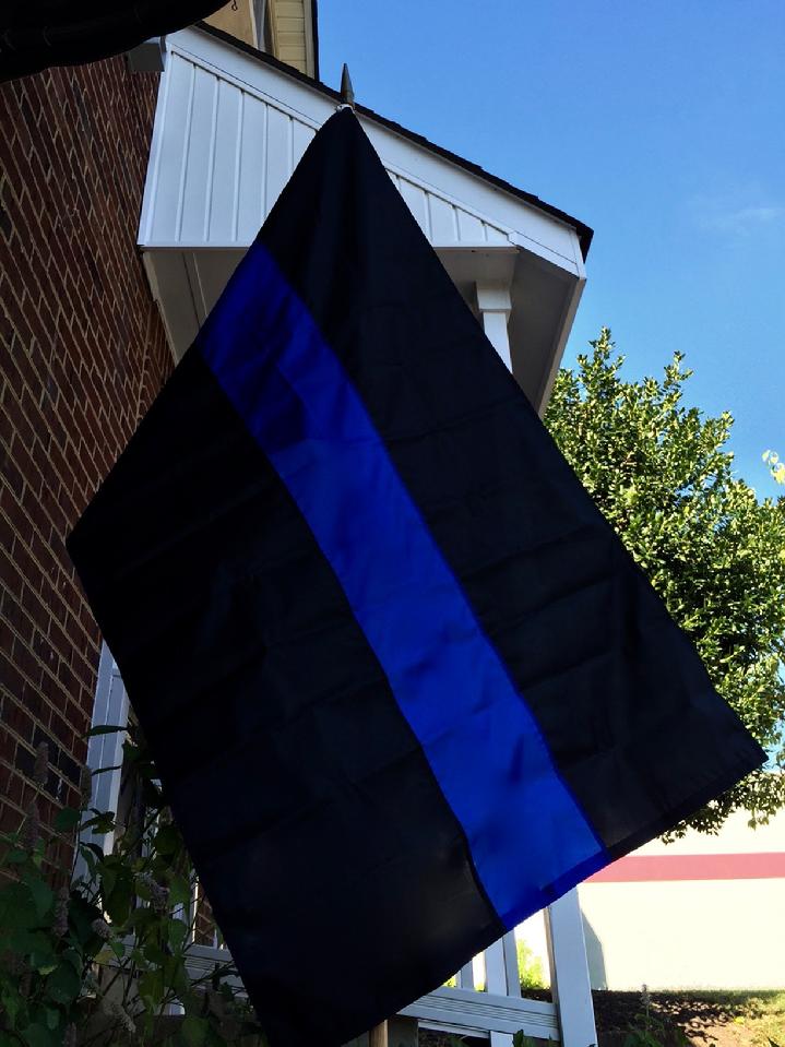 THIN BLUE LINE FLAG BY BALD EAGLE FLAG STORE DIVISION OF BALD EAGLE INDUSTRIES 540-374-3480 PHOTOGRAPH BY BALDEAGLEINDUSTRIES.COM