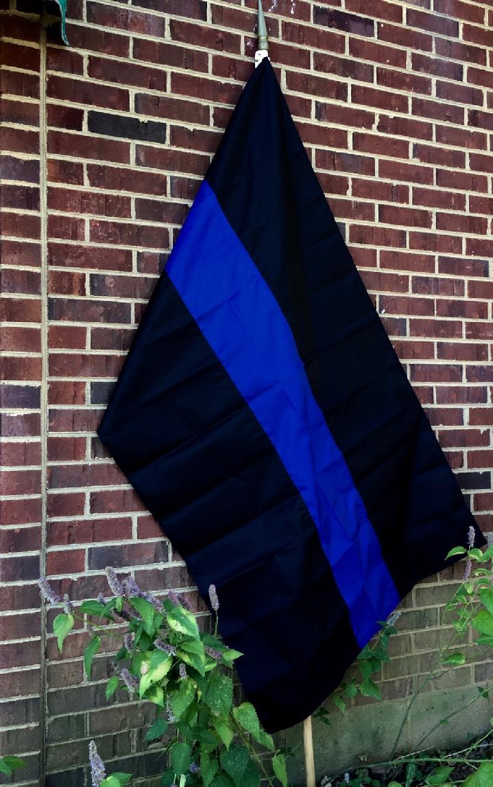 THIN BLUE LINE FLAG BY BALD EAGLE FLAG STORE DIVISION OF BALD EAGLE INDUSTRIES 540-374-3480 PHOTOGRAPH BY BALDEAGLEINDUSTRIES.COM
