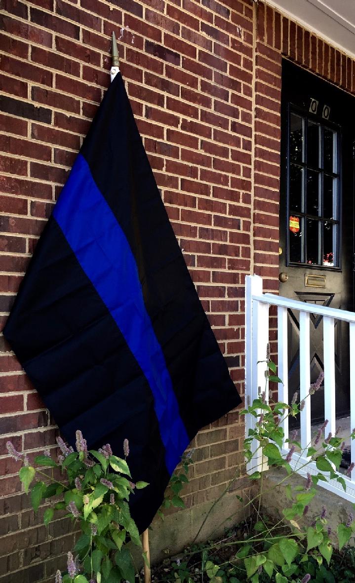 THIN BLUE LINE FLAG BY BALD EAGLE FLAG STORE DIVISION OF BALD EAGLE INDUSTRIES 540-374-3480 PHOTOGRAPH BY BALDEAGLEINDUSTRIES.COM