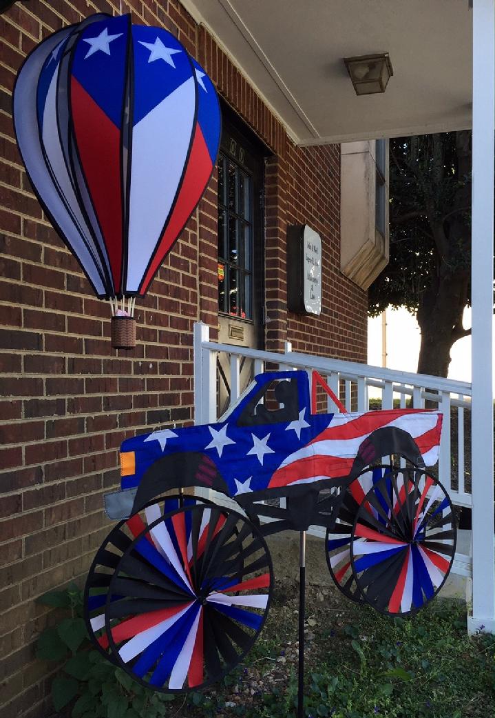 PATRIOTIC DECORATION AMERICAN FLAG PICKUP TRUCK AND PATRIOTIC HOT AIR BALLOON SPINNER BY BALD EAGLE FLAG STORE SERVING FREDERICKSBURG, RICHMOND, HAMPTON, NEWPORT NEWS, NORFOLK, VA BEACH, ARLINGTON, ALEXANDRIA, FAIRFAX, WINCHESTER, HARRISONBURG, ROANOKE, CHARLOTTESVILLE, WARRANTOR, STAFFORD (540) 374-3480 PHOTOGRAPH BY BALDEAGLEINDUSTRIES.COM