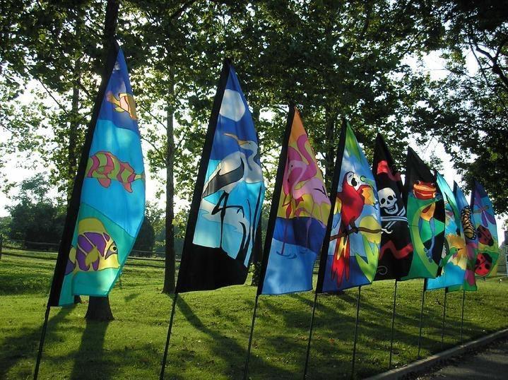 VINTAGE FISH FLAG, HERON FLAG, FLAMINGO FLAG, PARROT FLAG, PIRATE FLAG, FROG FLAG, HUMMINGBIRD FLAG, BUTTERFLY FLAG AND LADYBUG FLAG BY BALD EAGLE FLAG STORE USA, PHOTOGRAPH BY BALDEAGLEINDUSTRIES.COM (540) 374-3480