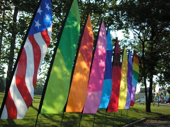 TALL PATRIOTIC FEATHER BANNER AND RAINBOW FEATHER BANNER BY BALD EAGLE FLAG STORE FREDERICKSBURG VIRGINIA USA (540) 374-3480 PHOTOGRAPH BY BALDEAGLEINDUSTRIES.COM
