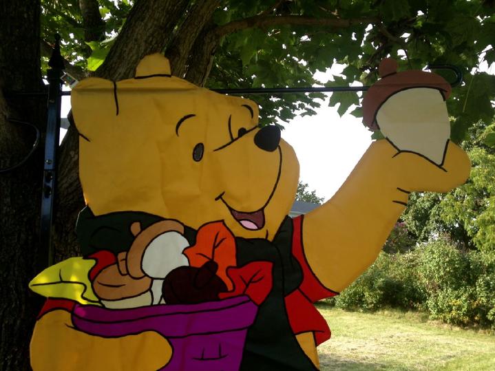 large winnie the pooh flag made in 1998 at bald eagle flag store fredericksburg va, a large 3d flag from our private collection of vintage flags from years past, winnie the pooh holding an acorn flag, a rare winnie the pooh flag by new creative enterprises