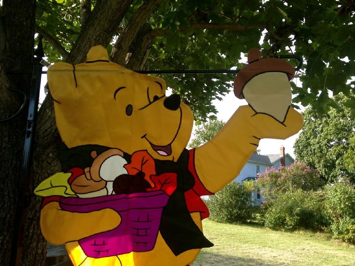 large winnie the pooh flag made in 1998 at bald eagle flag store fredericksburg va, a large 3d flag from our private collection of vintage flags from years past, winnie the pooh holding an acorn flag, a rare winnie the pooh flag by new creative enterprises